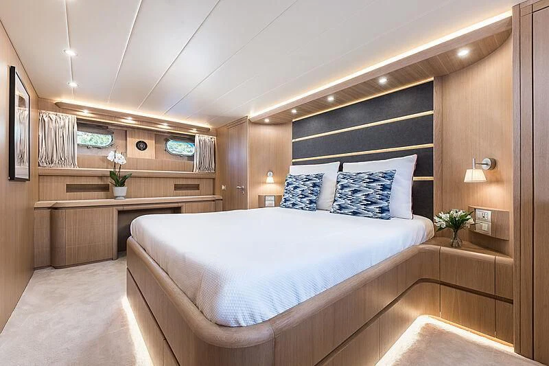 a bed in a room aboard POBEDY I Yacht for Sale