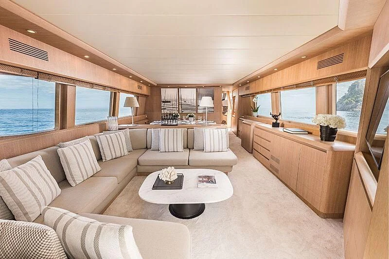 a living room with a large window aboard POBEDY I Yacht for Sale