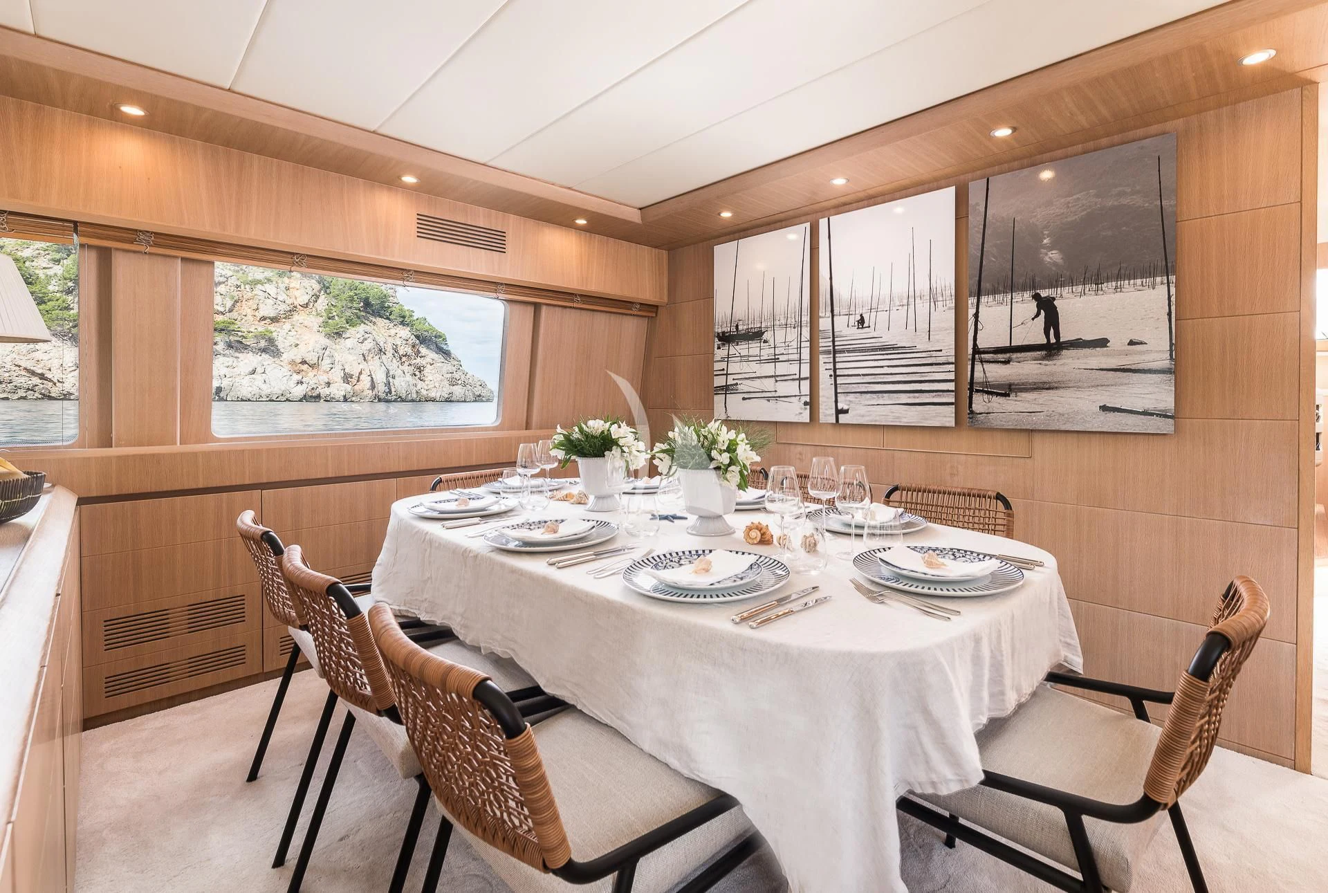 a dining table set for a meal aboard POBEDY I Yacht for Sale