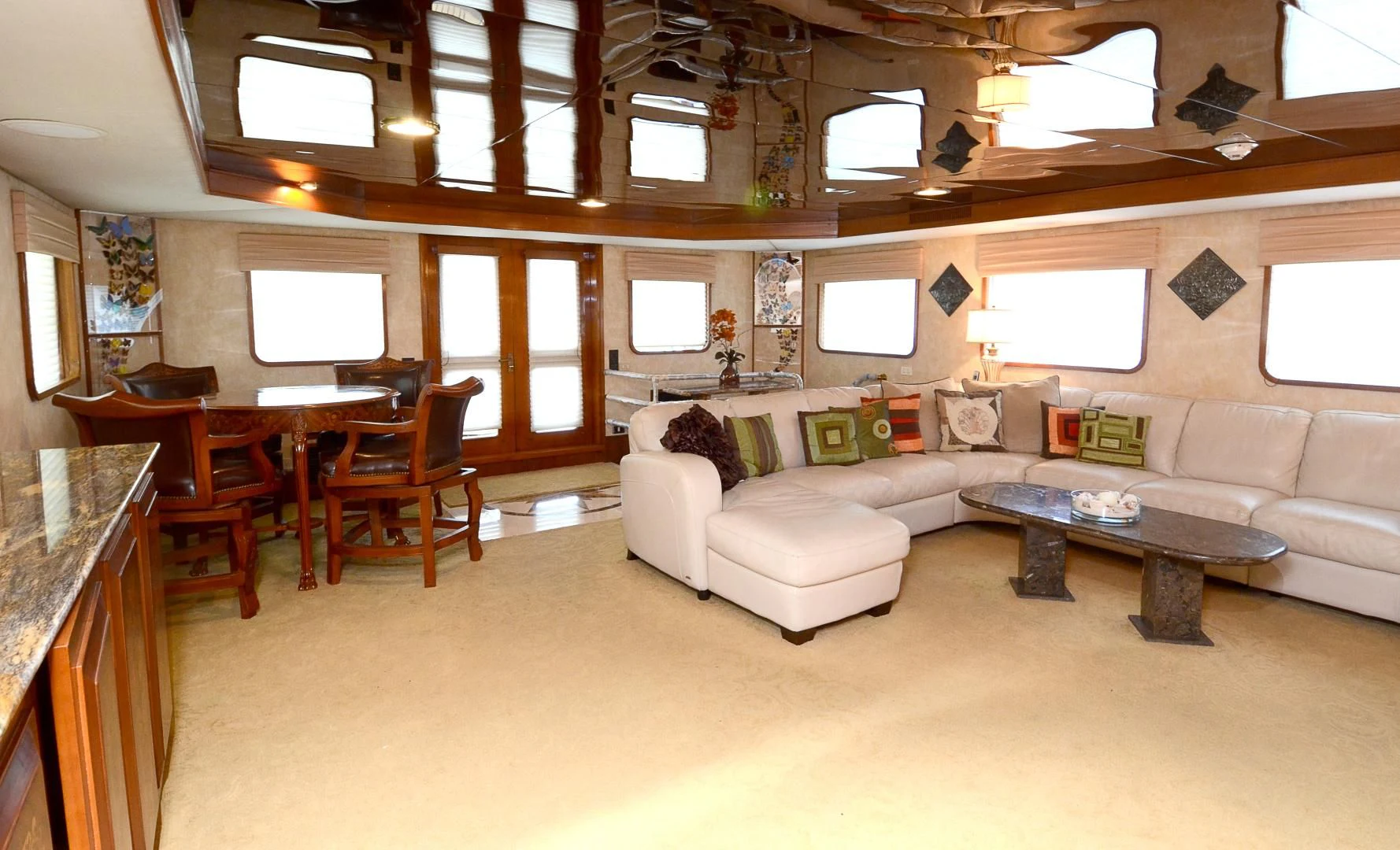 a living room with a couch and a table aboard SHENANDOAH Yacht for Sale