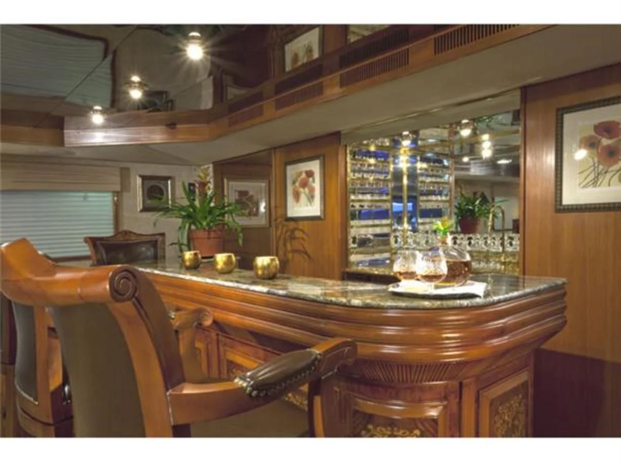 a large dining table in a room aboard SHENANDOAH Yacht for Sale