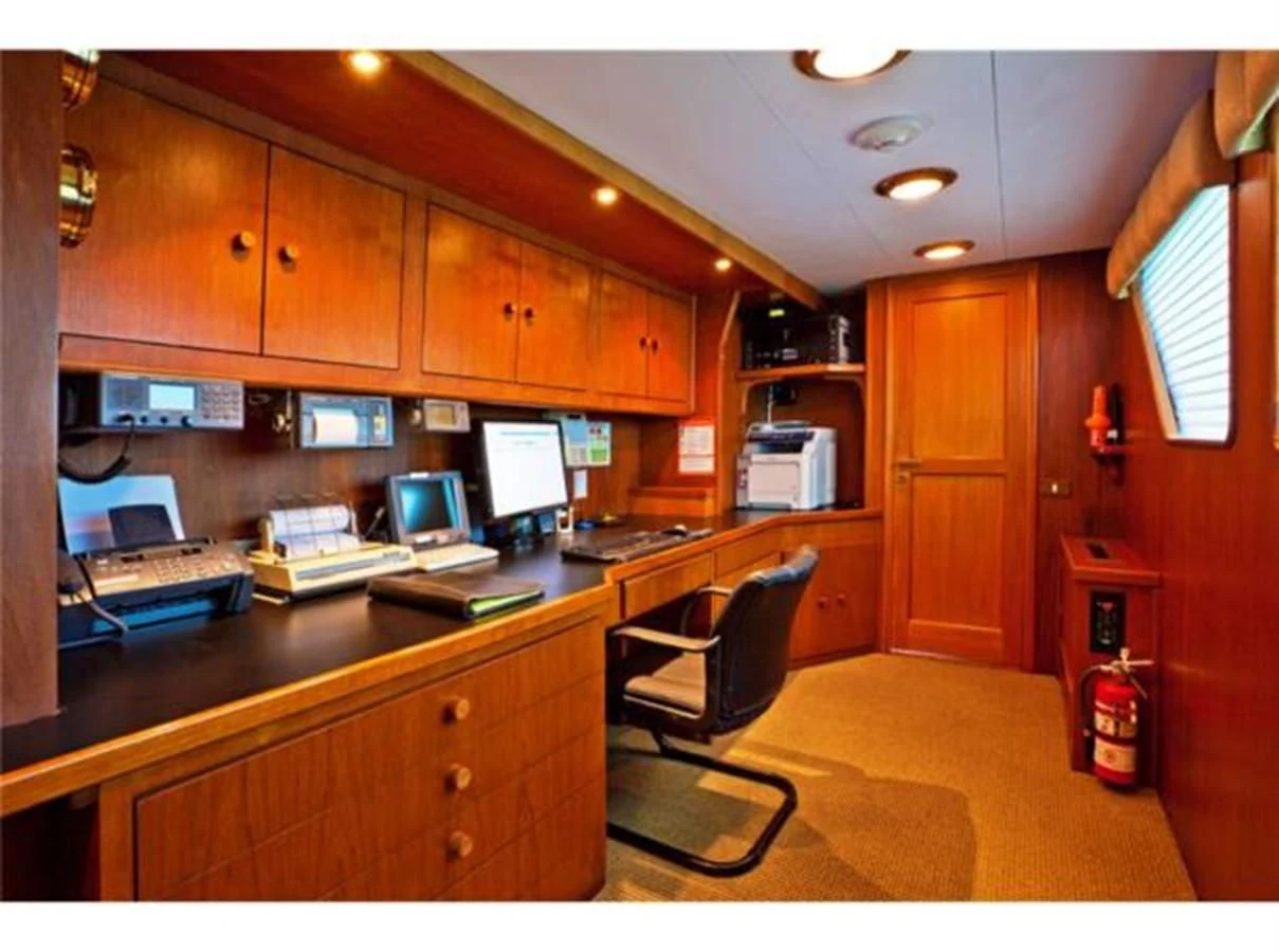 an office with a desk and computer aboard SHENANDOAH Yacht for Sale