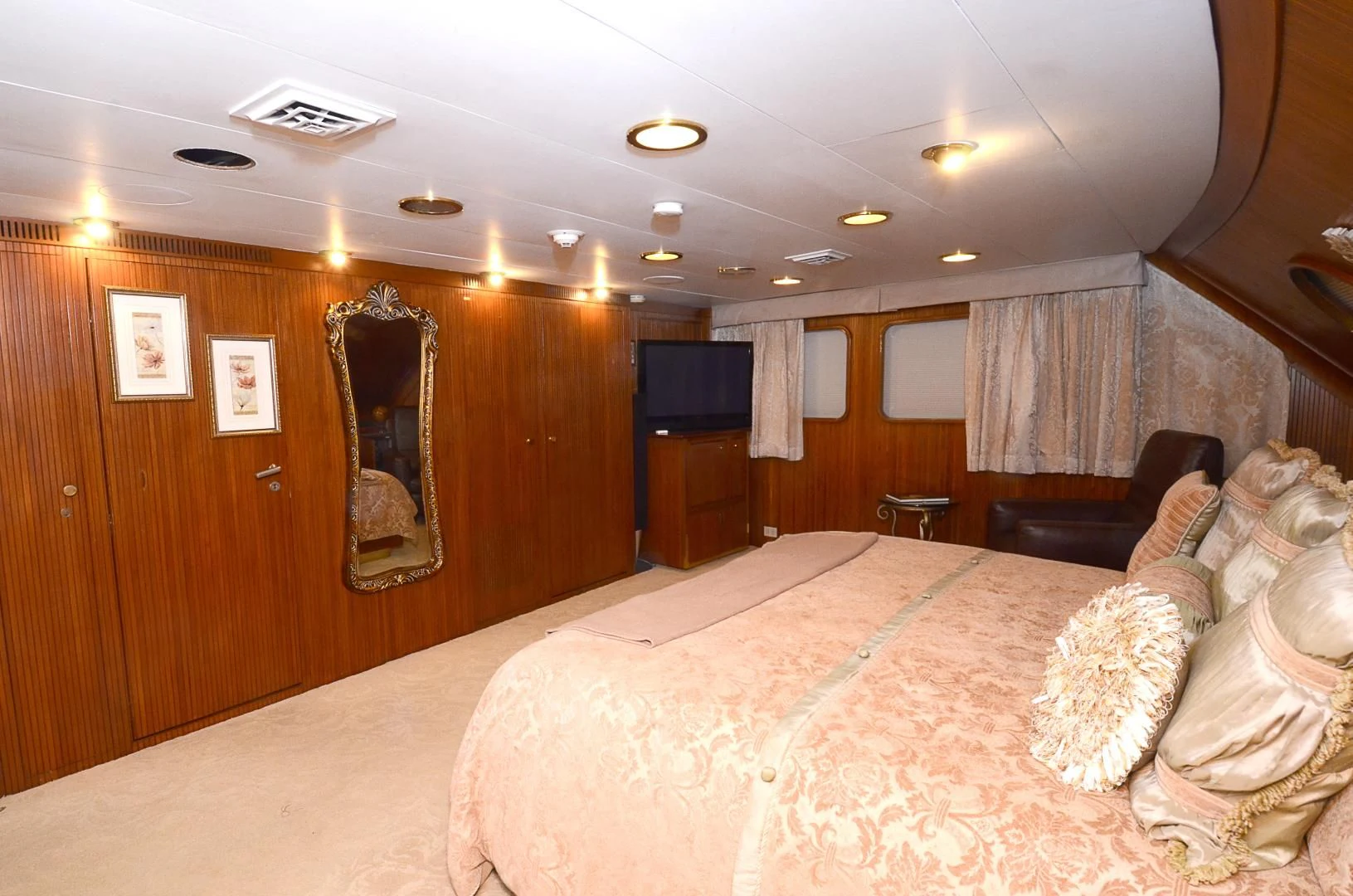 a bed in a room aboard SHENANDOAH Yacht for Sale