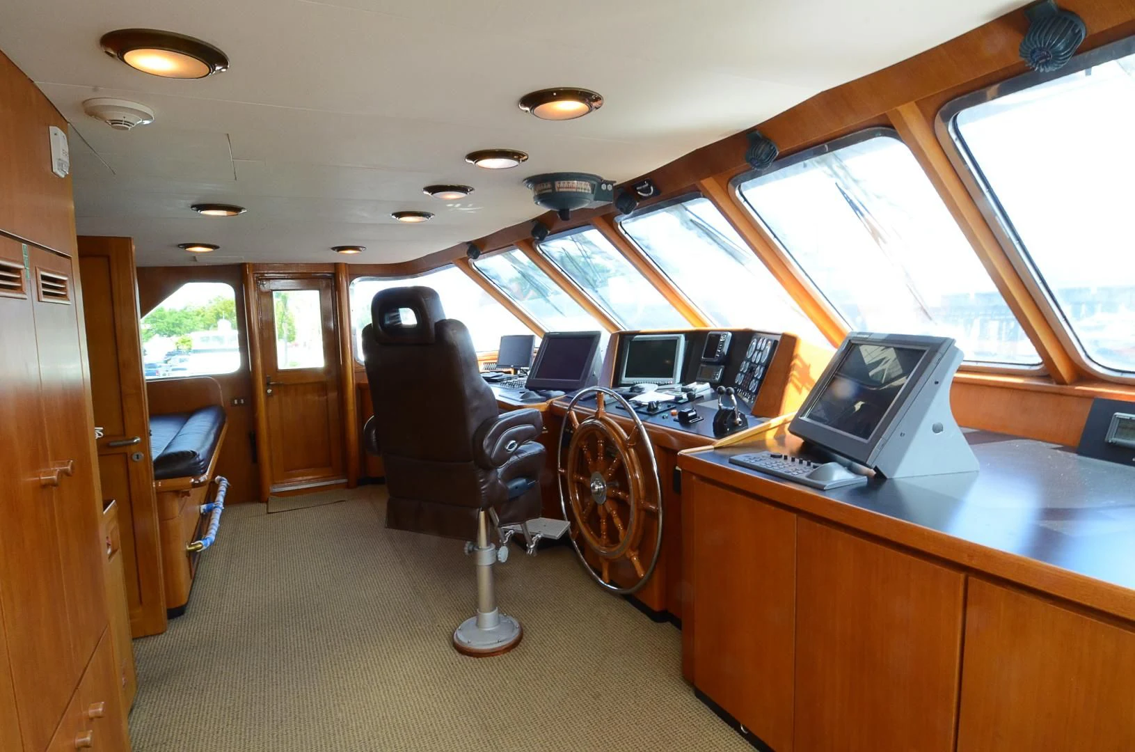 a room with a desk and chairs aboard SHENANDOAH Yacht for Sale