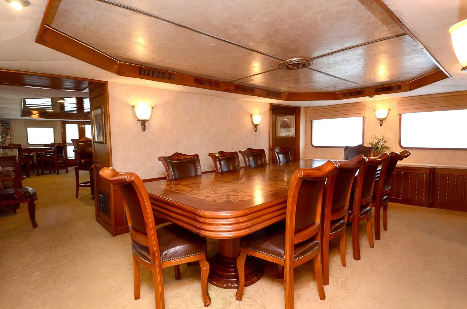 a dining room with a table and chairs aboard SHENANDOAH Yacht for Sale