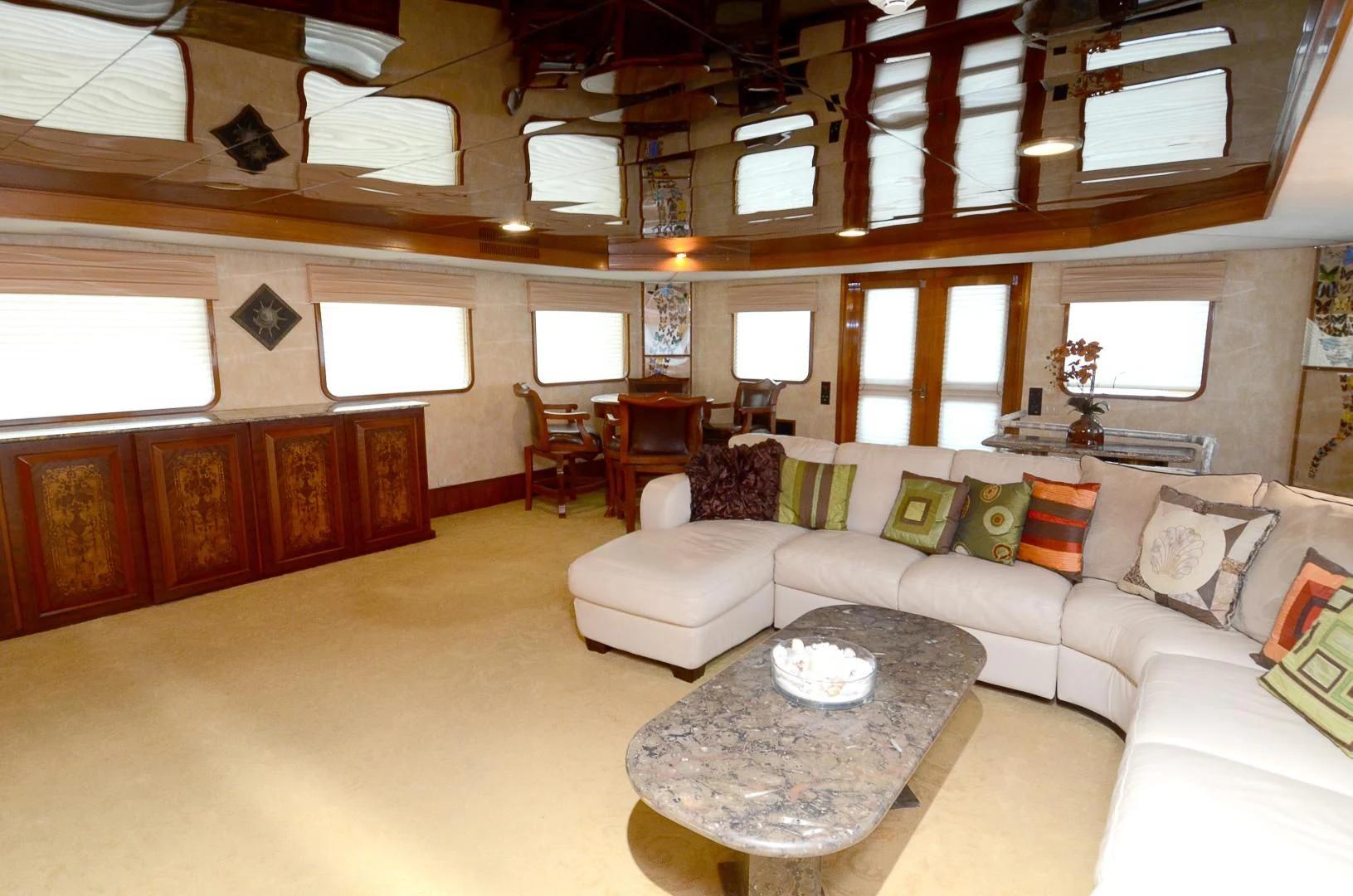 a living room with a couch and a table aboard SHENANDOAH Yacht for Sale