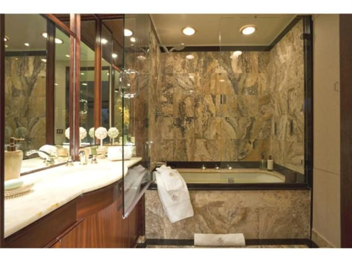 a bathroom with a large mirror aboard SHENANDOAH Yacht for Sale