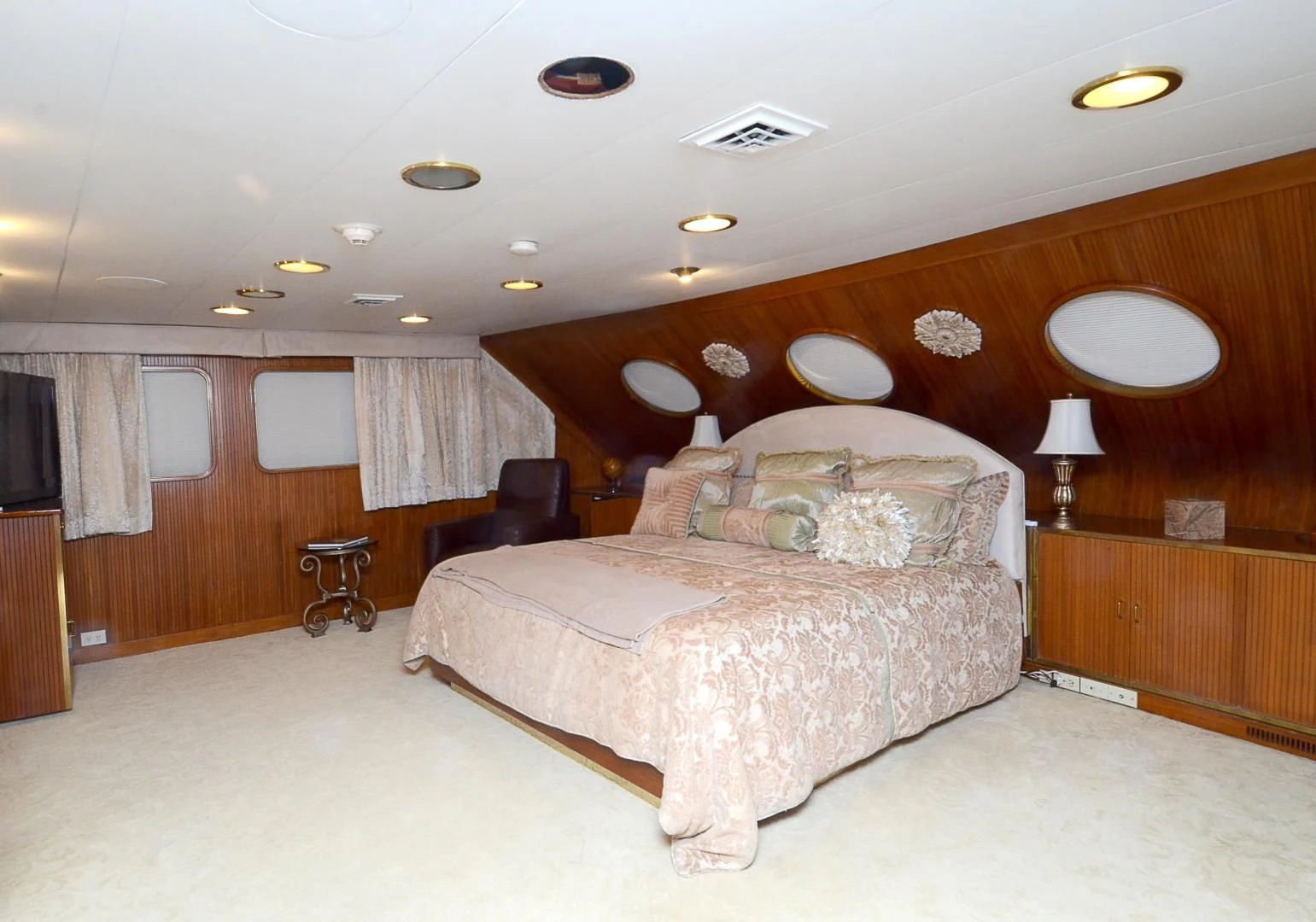 a large bedroom with a large bed aboard SHENANDOAH Yacht for Sale