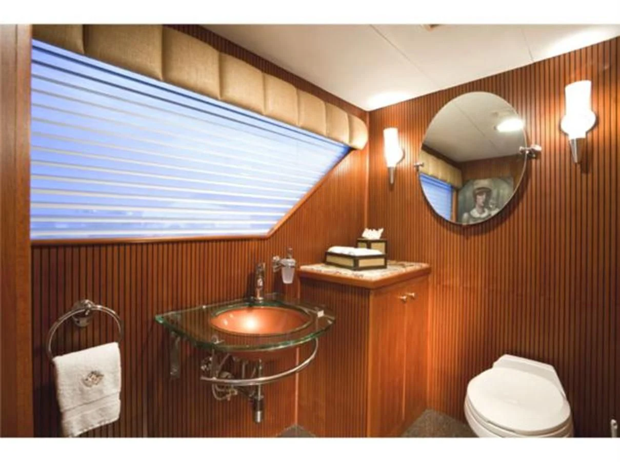 a bathroom with a sink and toilet aboard SHENANDOAH Yacht for Sale