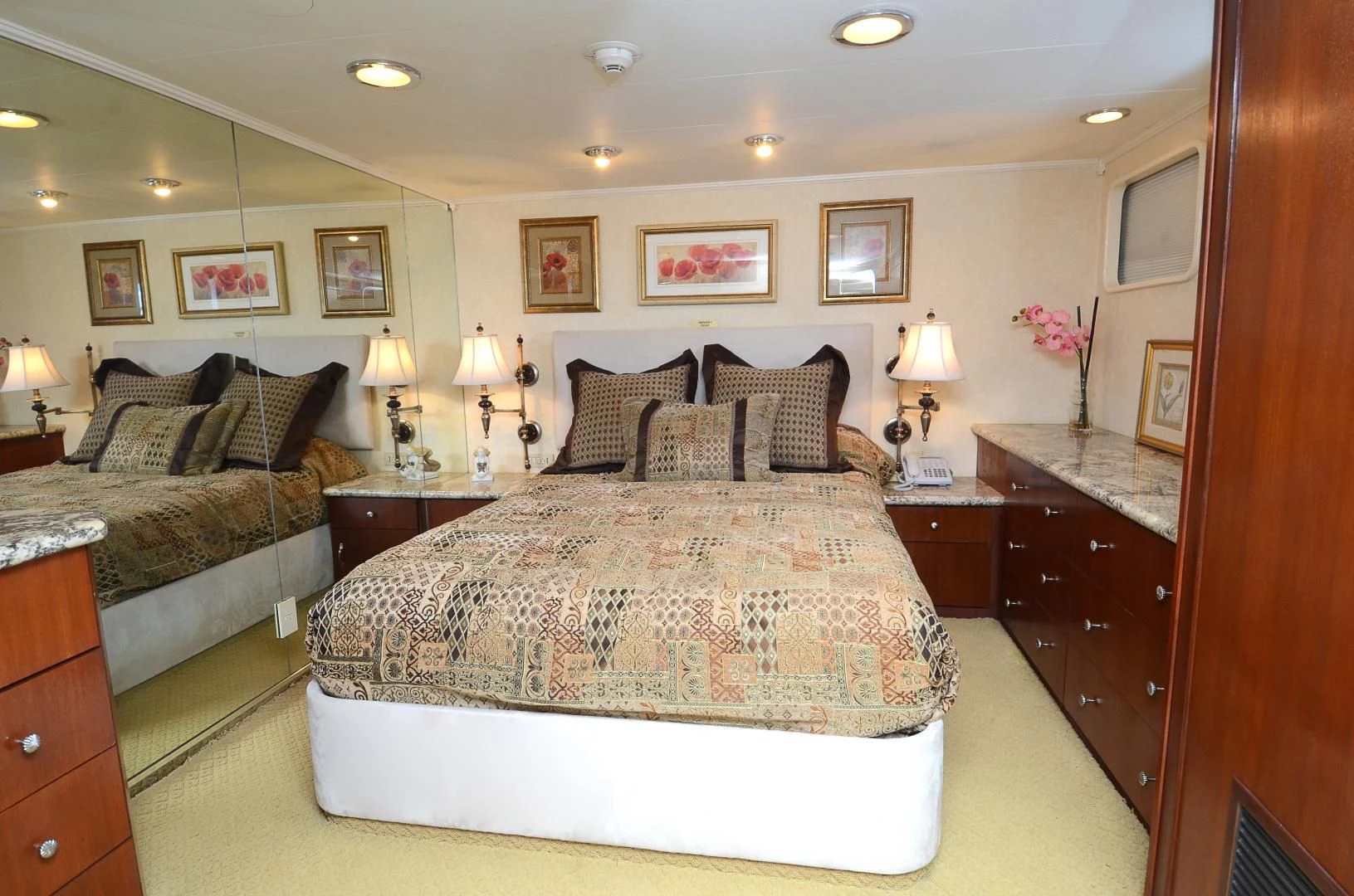 a bedroom with a bed and a couch aboard SHENANDOAH Yacht for Sale
