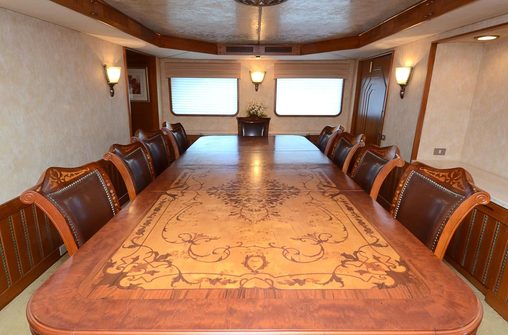 a large room with a large table and chairs aboard SHENANDOAH Yacht for Sale