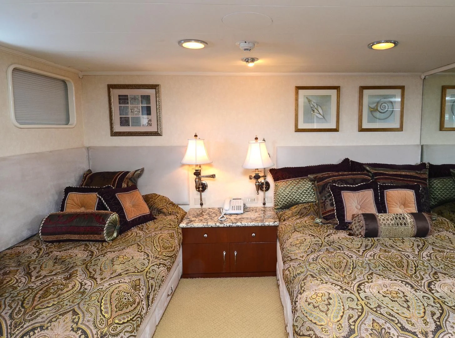a couple of beds in a hotel room aboard SHENANDOAH Yacht for Sale