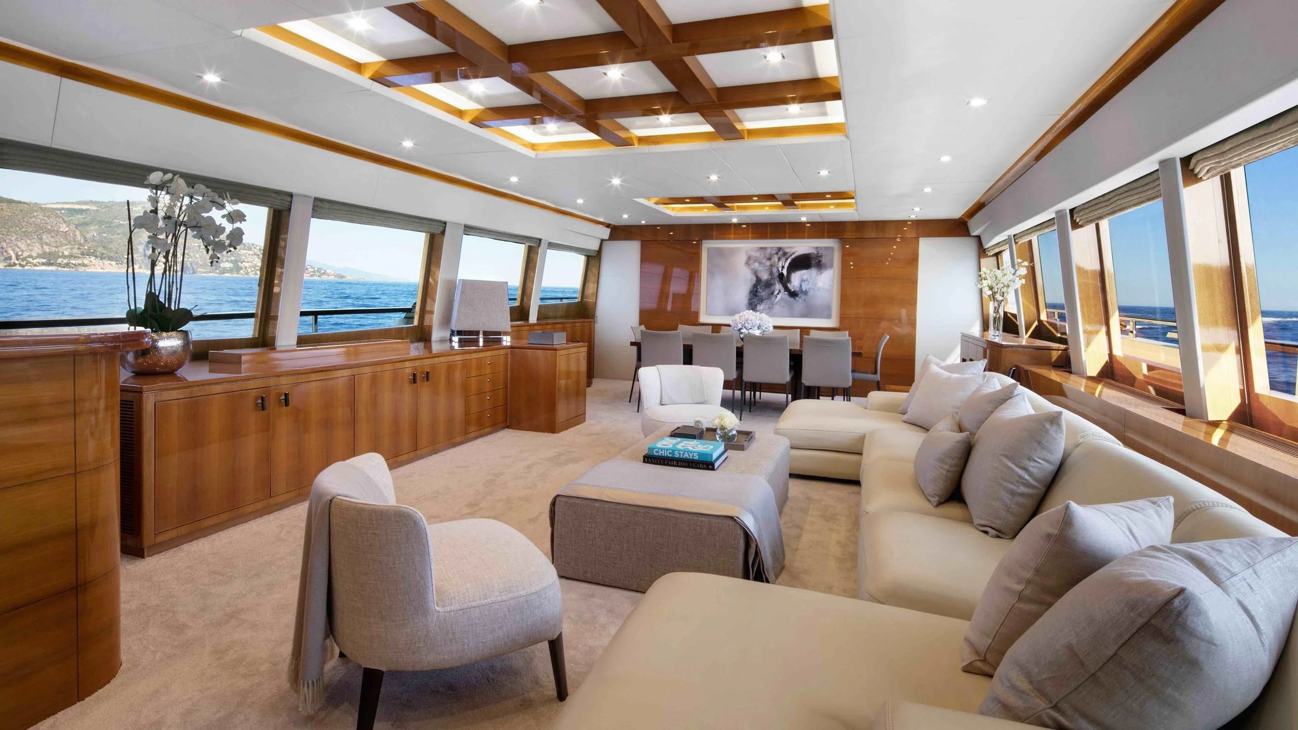 a living room with a large window aboard APMONIA Yacht for Sale