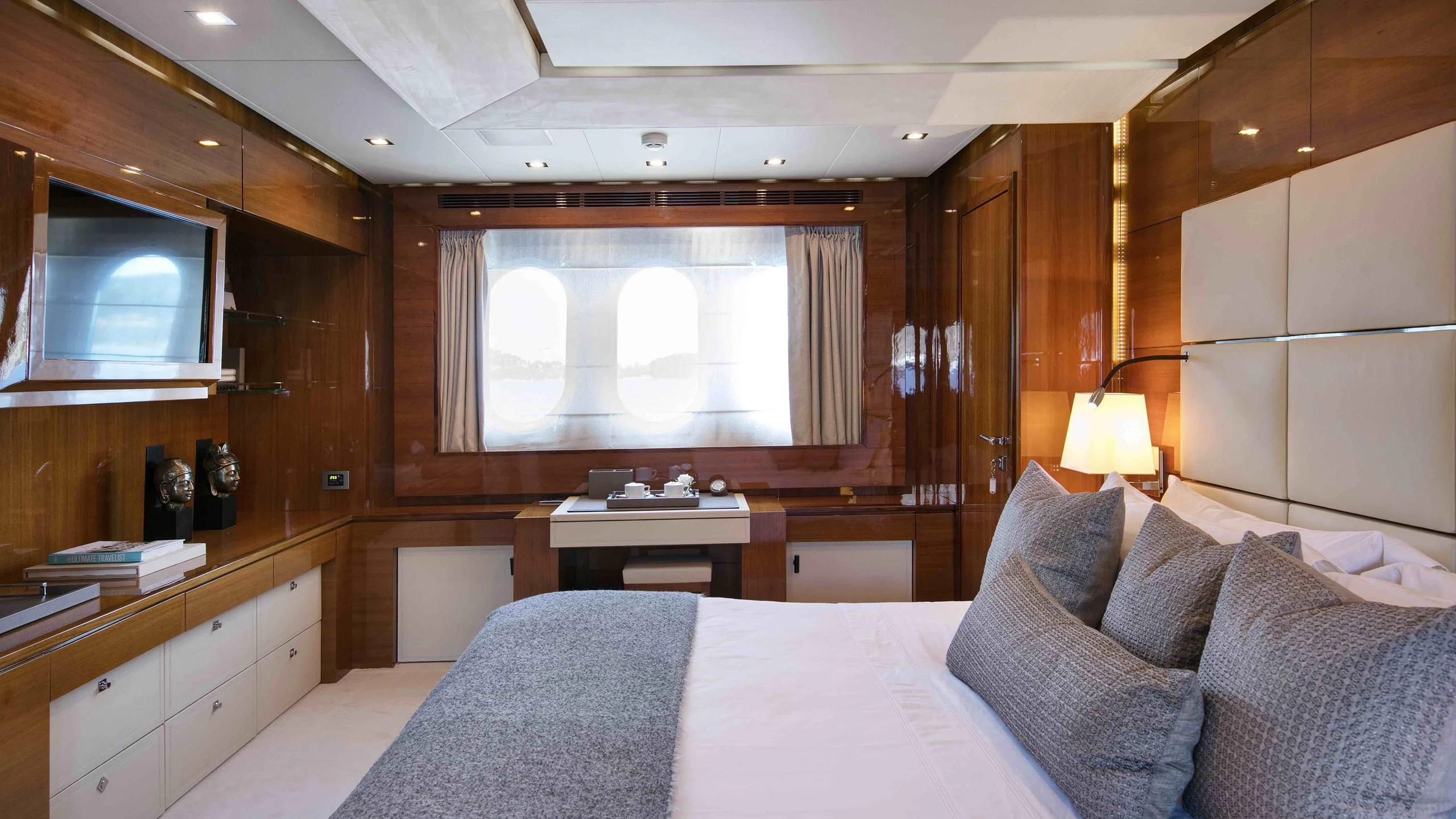 a bed in a room aboard APMONIA Yacht for Sale