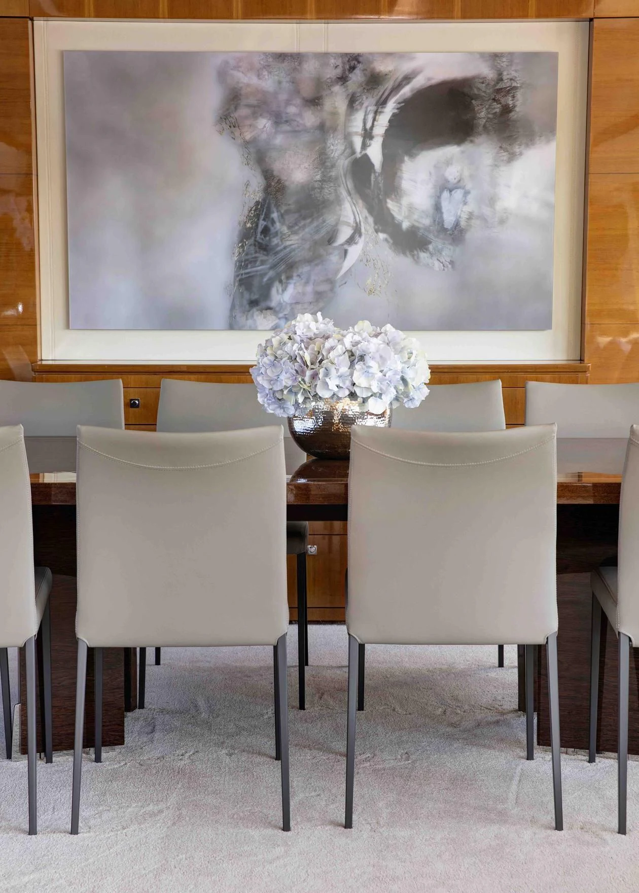 a room with chairs and a table aboard APMONIA Yacht for Sale