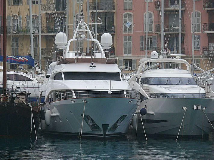 several boats docked in a harbor aboard ARTEMIS Yacht for Sale
