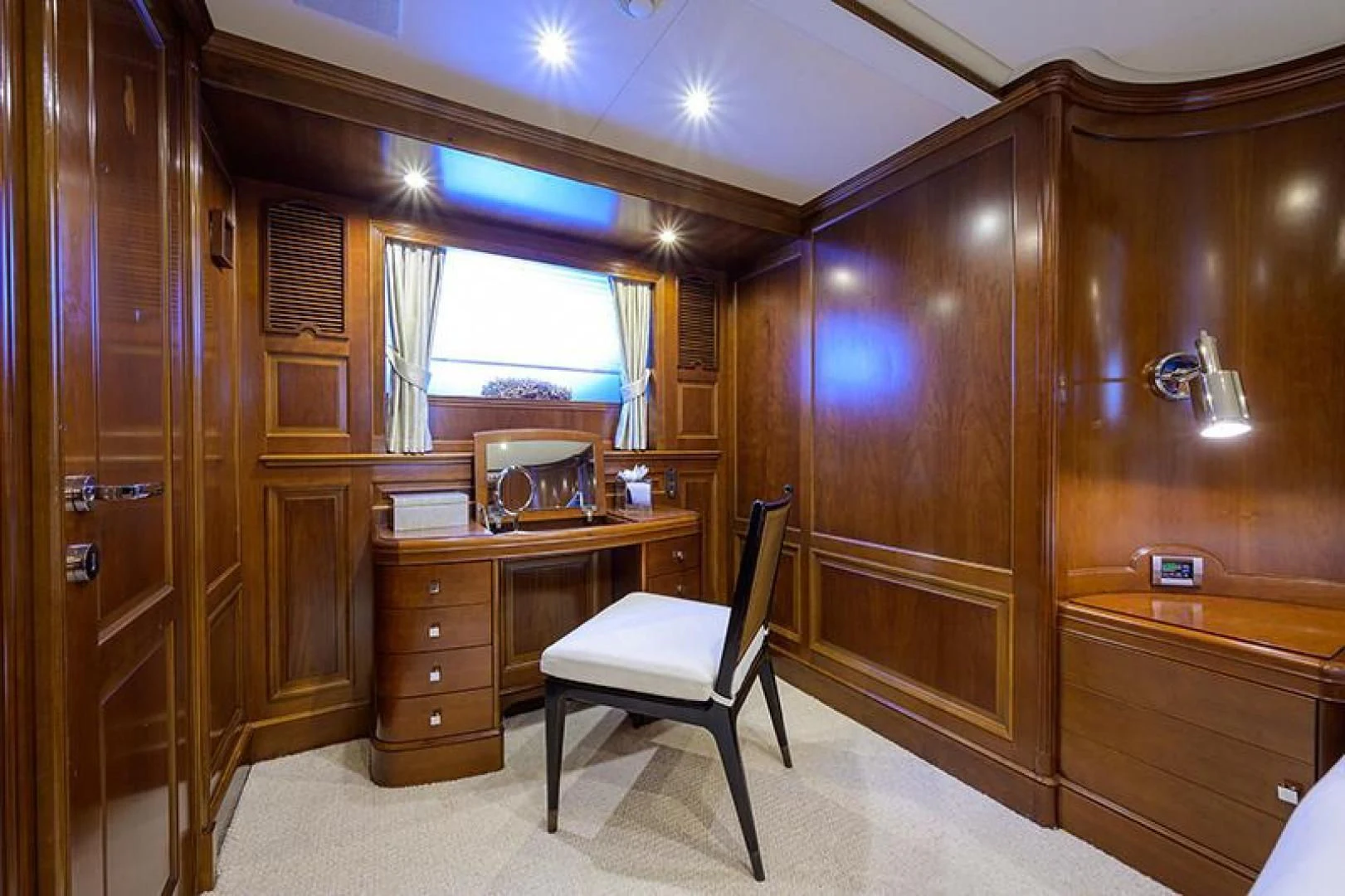 a room with a chair and a desk aboard ARTEMIS Yacht for Sale