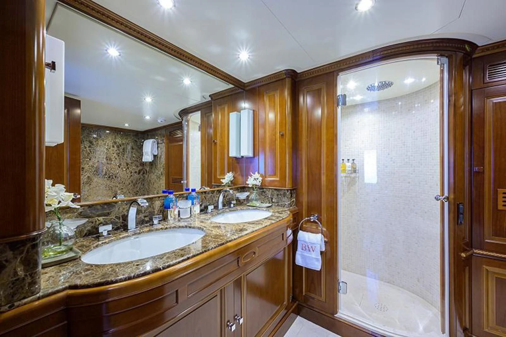 a bathroom with a sink and a shower aboard ARTEMIS Yacht for Sale