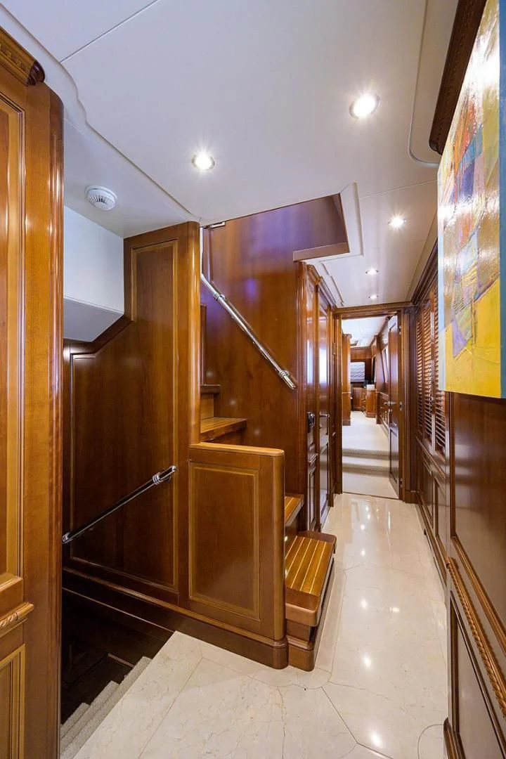 a hallway with a glass door aboard ARTEMIS Yacht for Sale