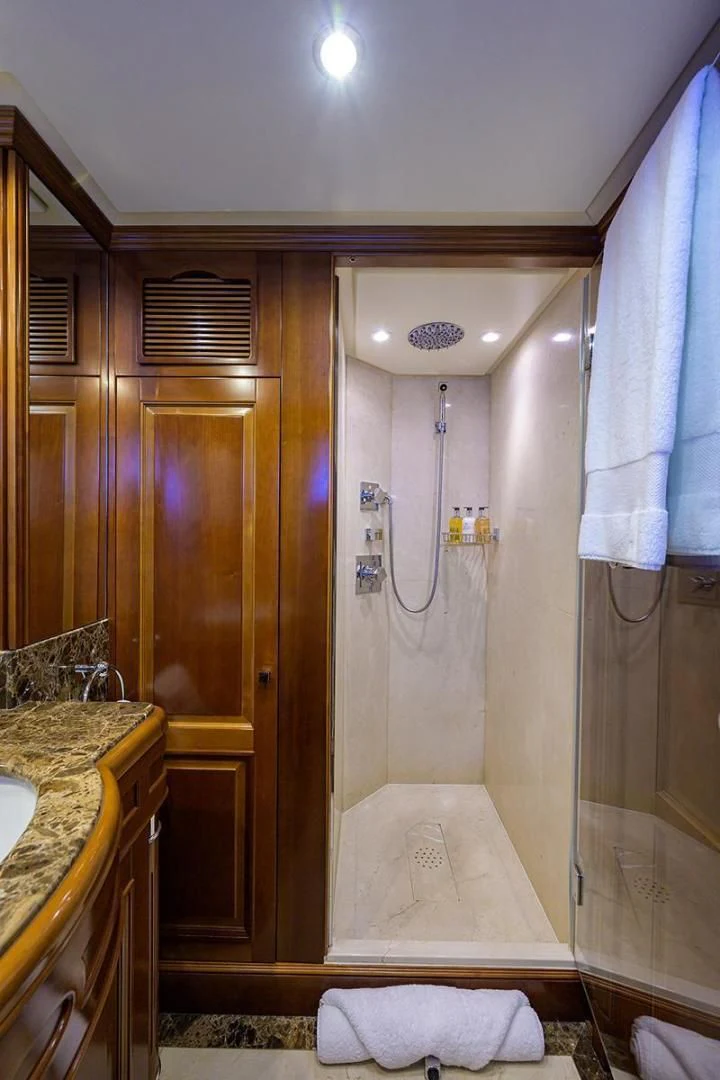 a bathroom with a shower and sink aboard ARTEMIS Yacht for Sale
