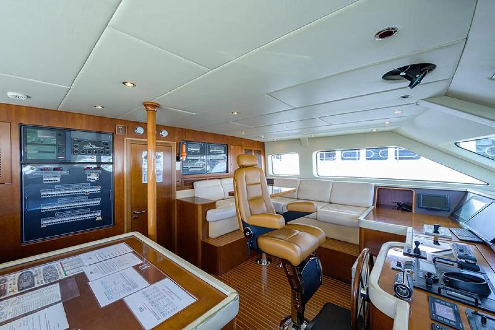 a room with a desk and chairs aboard ARTEMIS Yacht for Sale