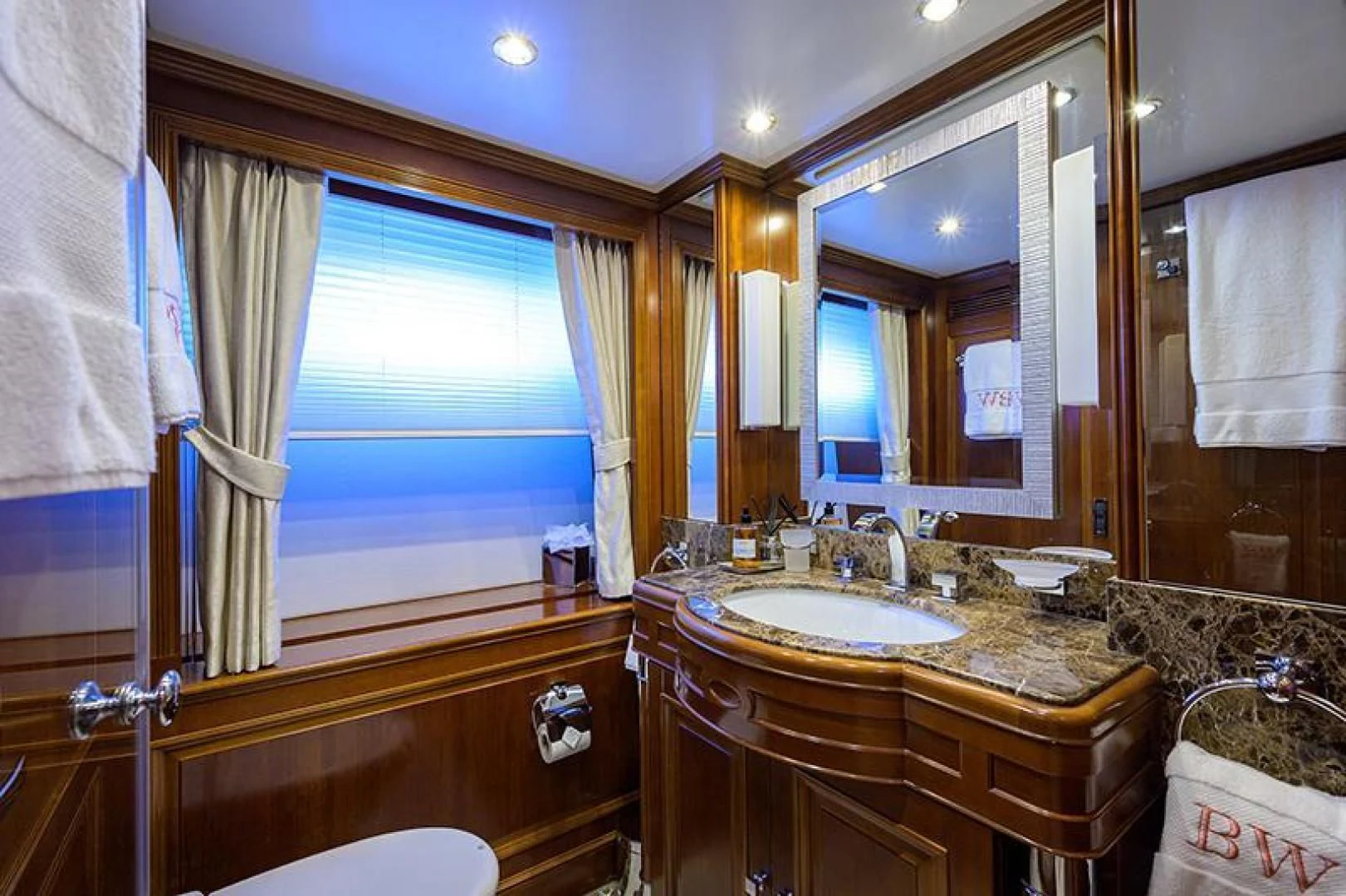 a bathroom with a sink and a mirror aboard ARTEMIS Yacht for Sale