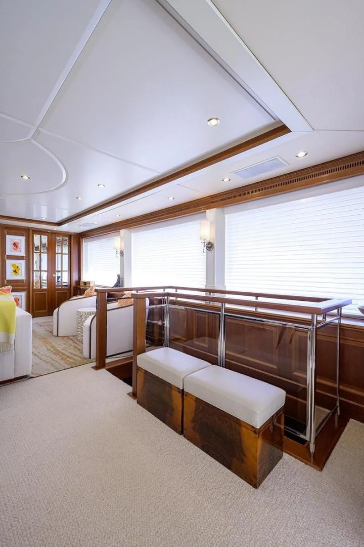 a large room with a bed and a large window aboard ARTEMIS Yacht for Sale
