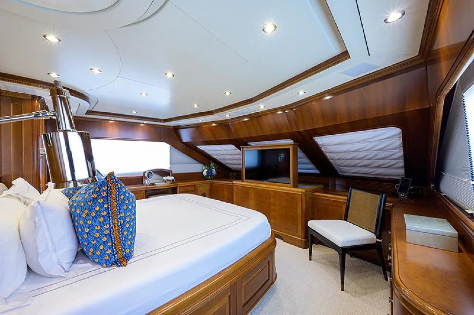 a room with a bed and a tv aboard ARTEMIS Yacht for Sale