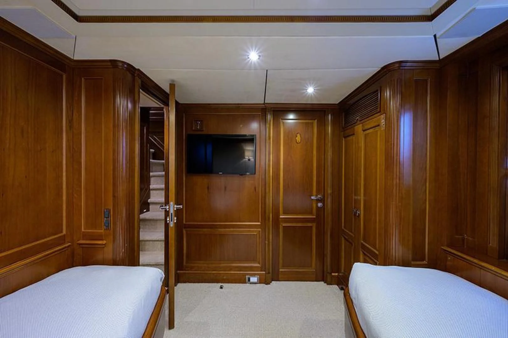 a room with wooden cabinets aboard ARTEMIS Yacht for Sale