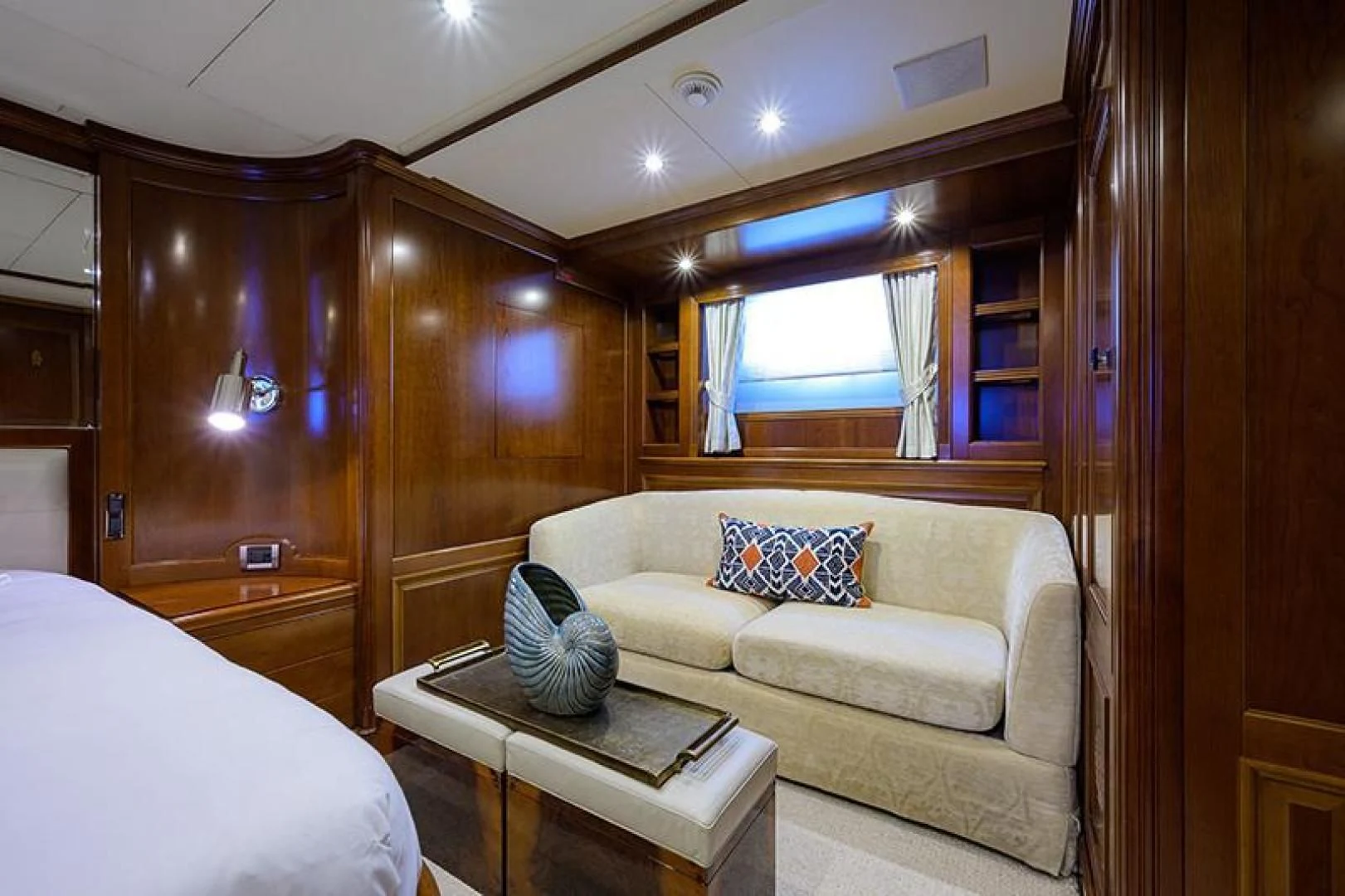 a living room with a couch and a table aboard ARTEMIS Yacht for Sale