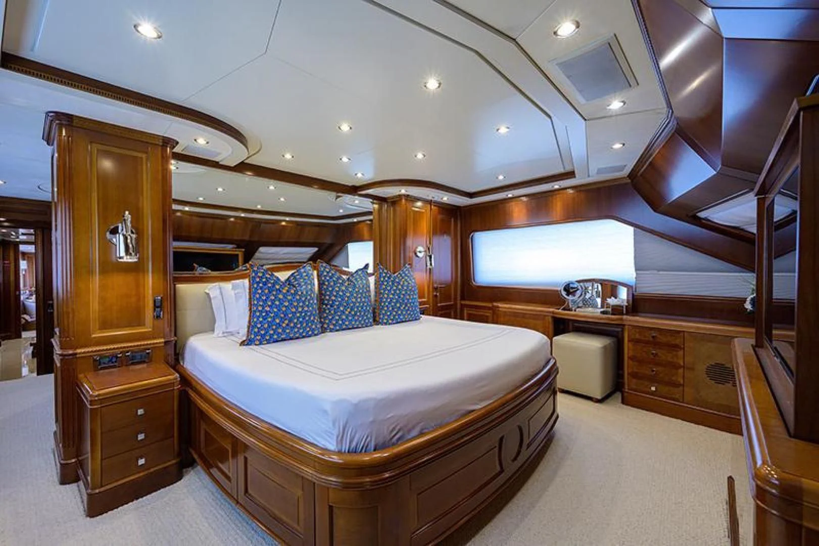 a bedroom with a large bed aboard ARTEMIS Yacht for Sale