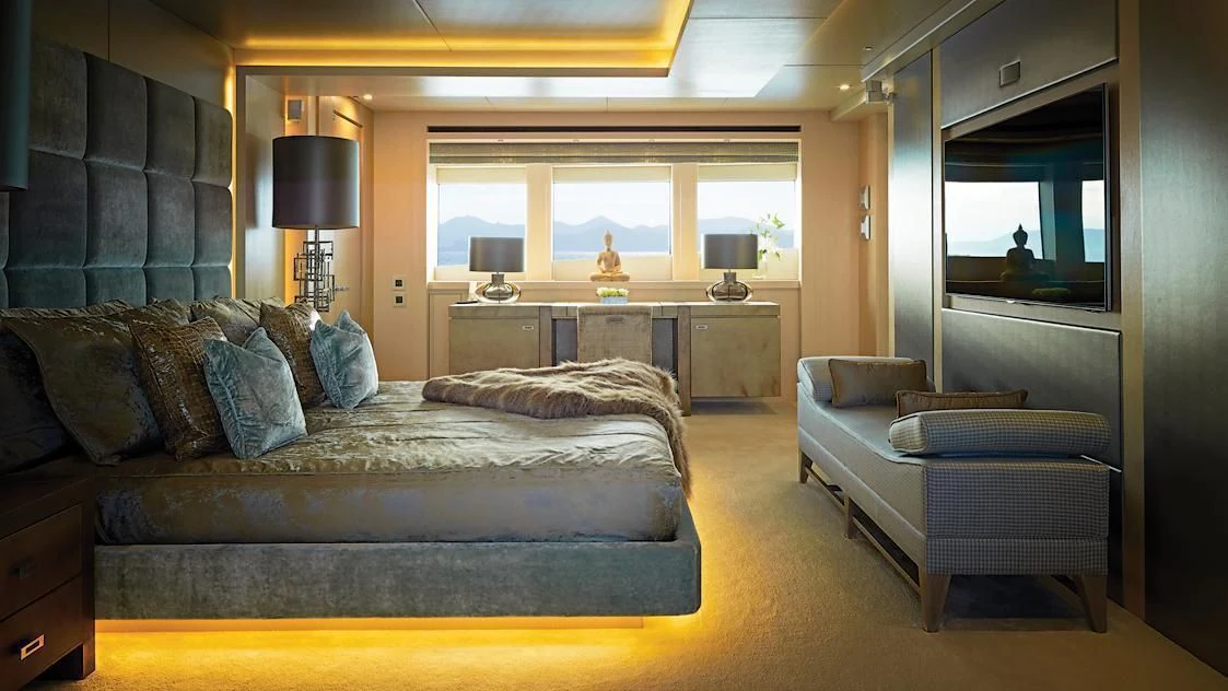 a large bedroom with a large bed aboard ARADOS Yacht for Charter