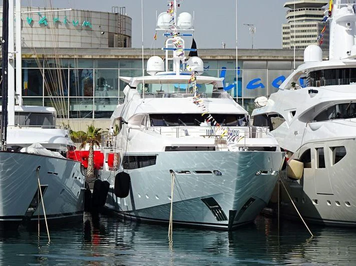several boats docked in a harbor aboard ARADOS Yacht for Charter