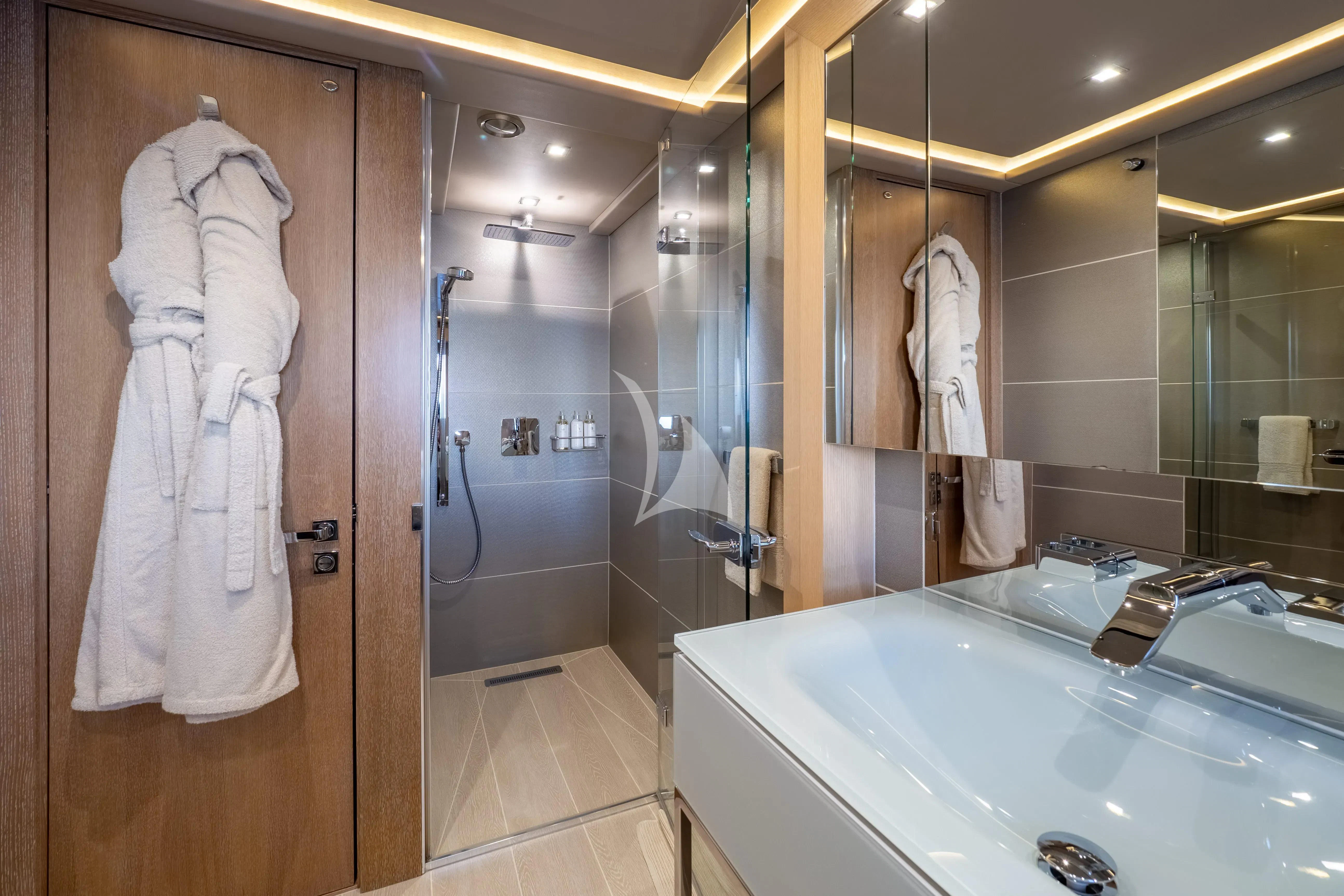a bathroom with a large bathtub aboard ARADOS Yacht for Charter