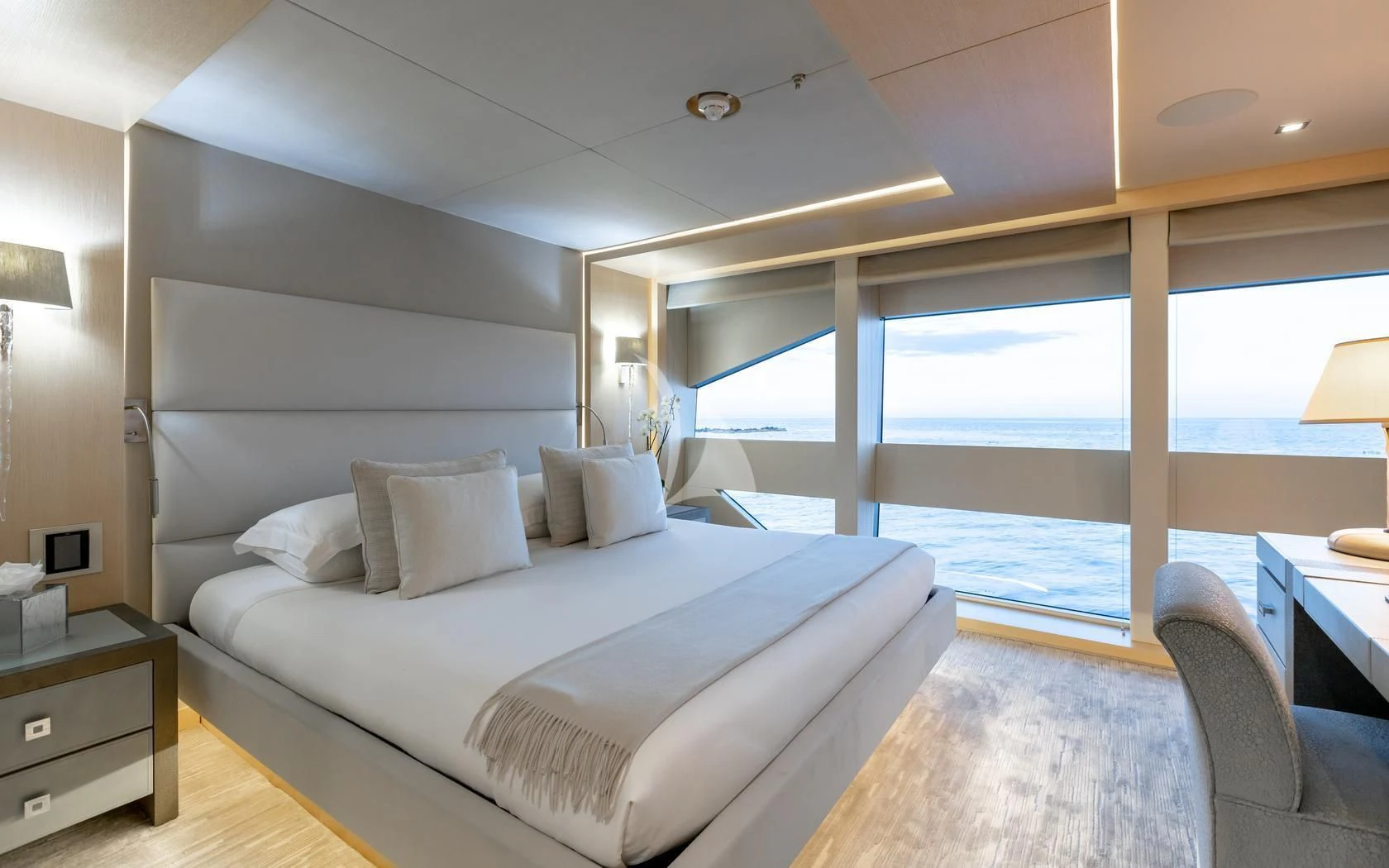 a large bed in a room aboard ARADOS Yacht for Charter