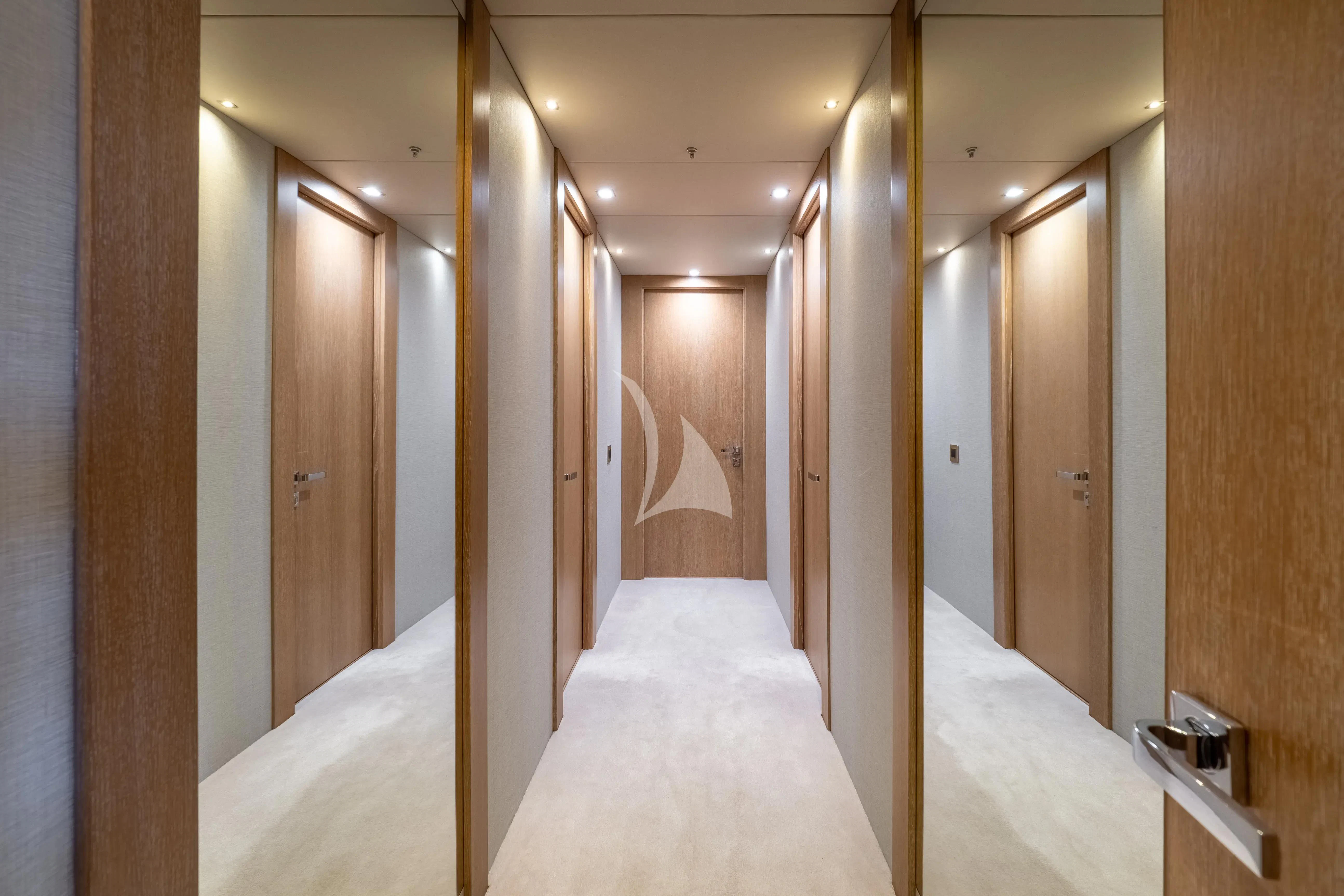 a room with a bed and a mirror aboard ARADOS Yacht for Charter