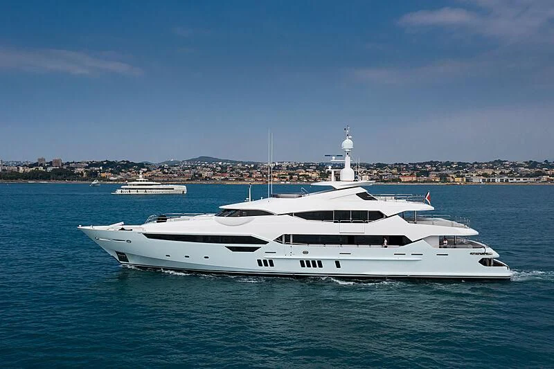 a white yacht in the water aboard ARADOS Yacht for Charter
