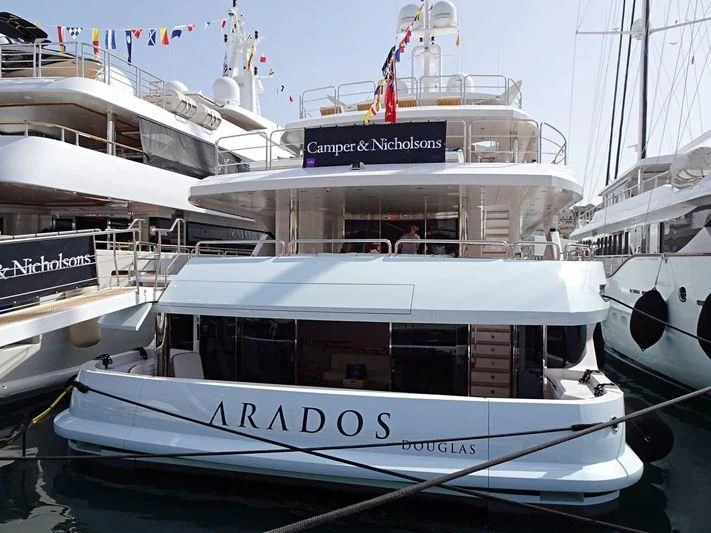 a group of boats in a harbor aboard ARADOS Yacht for Charter