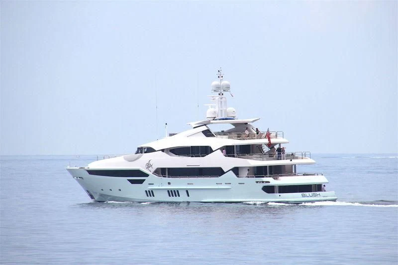 a white yacht in the water aboard ARADOS Yacht for Charter