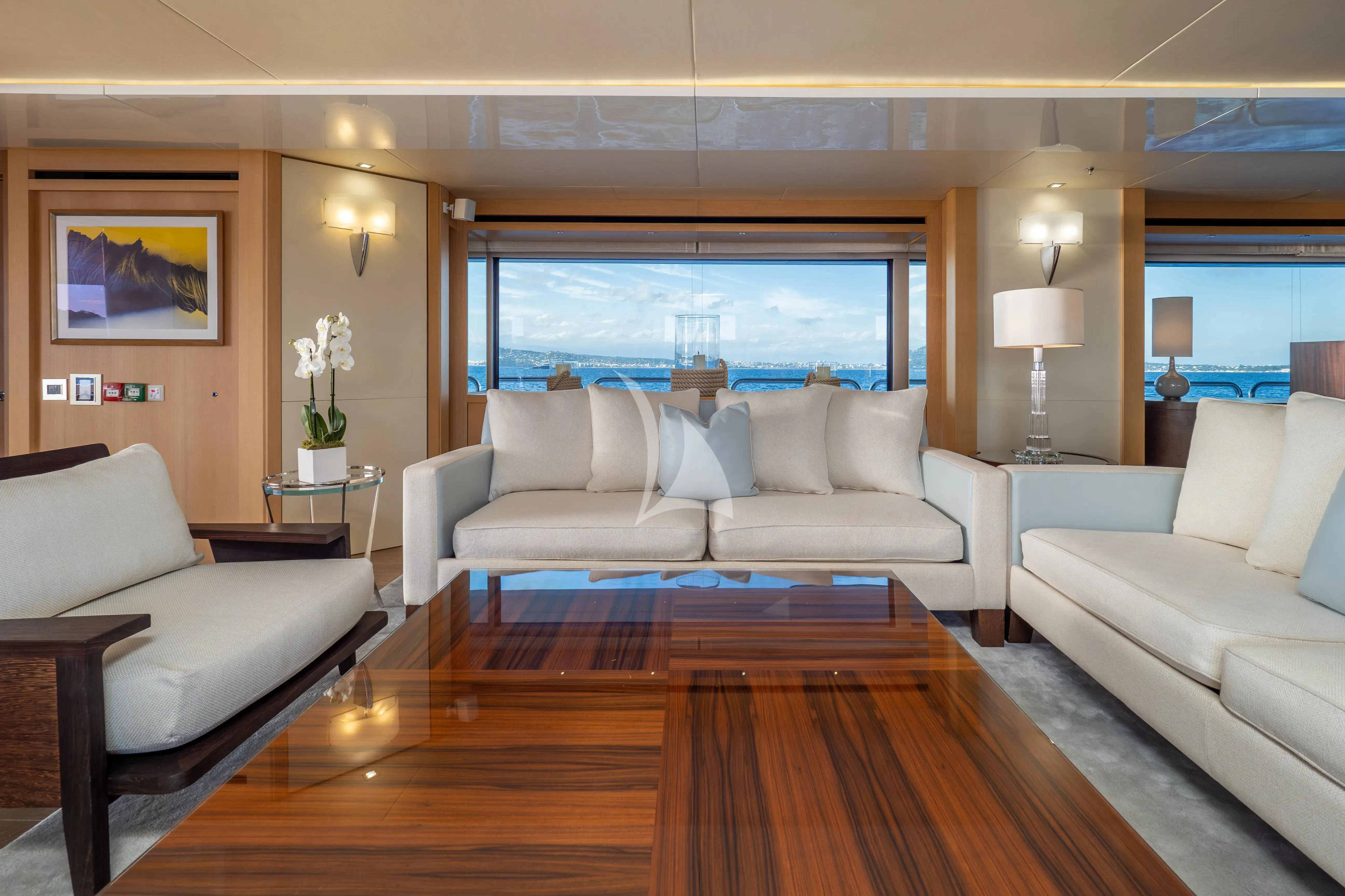 a living room with a large window aboard ARADOS Yacht for Charter