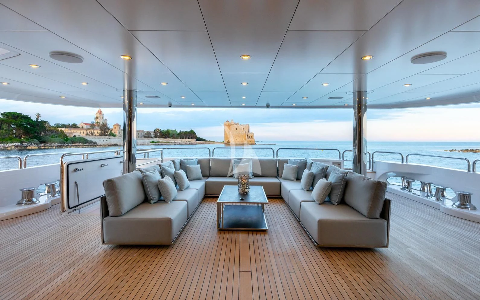 a living room with a large window aboard ARADOS Yacht for Charter