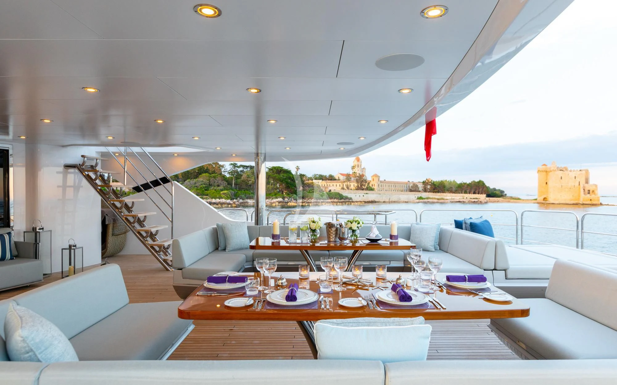 a large living room with a large patio area and a pool aboard ARADOS Yacht for Charter