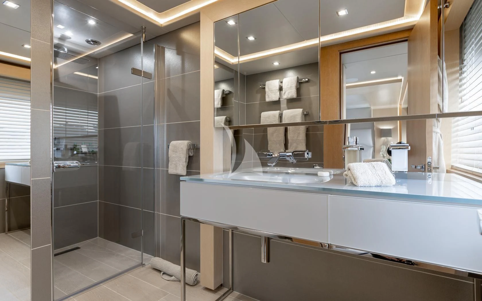 a bathroom with a large countertop aboard ARADOS Yacht for Charter