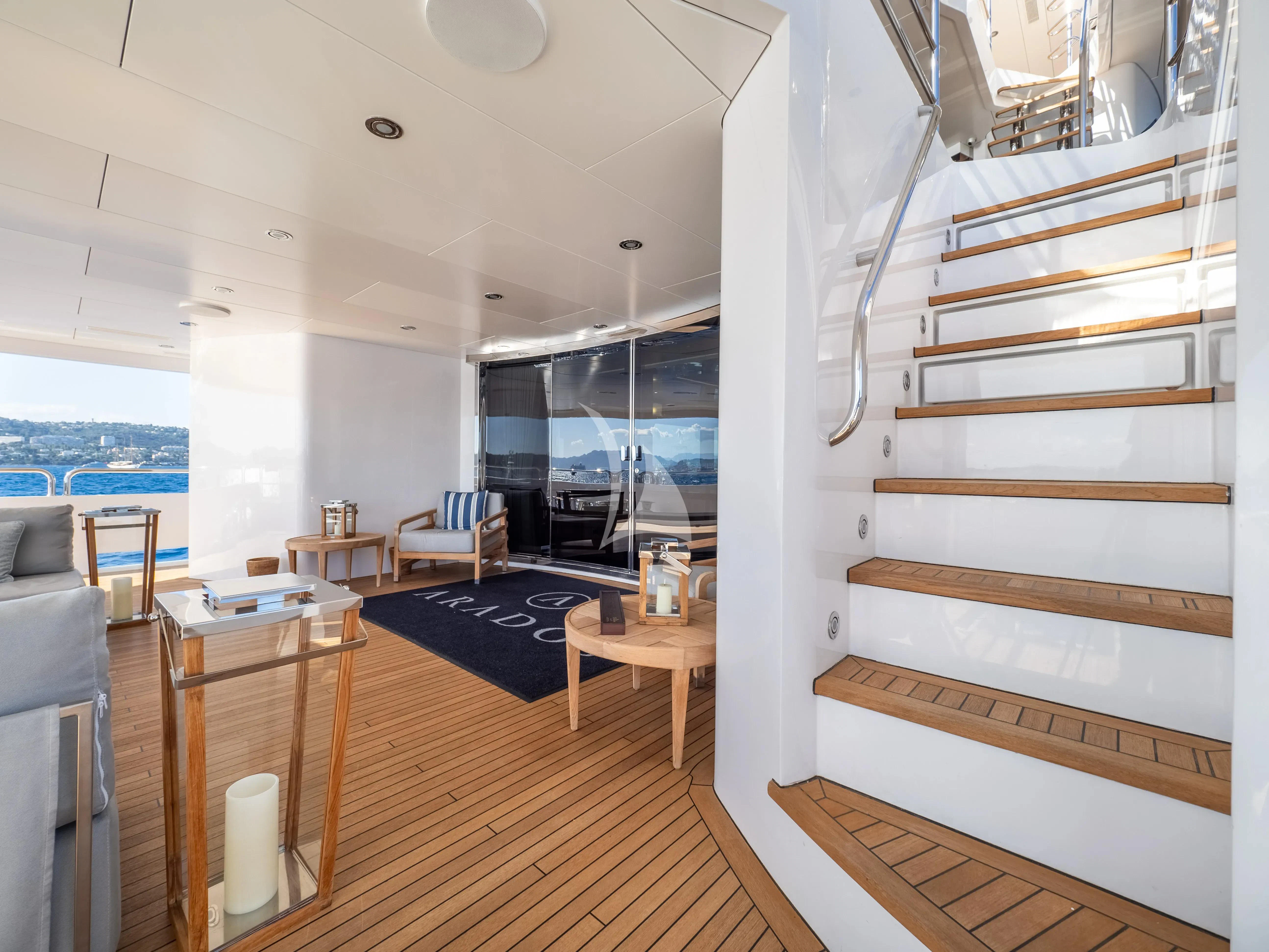 a room with a staircase and a wood floor aboard ARADOS Yacht for Charter