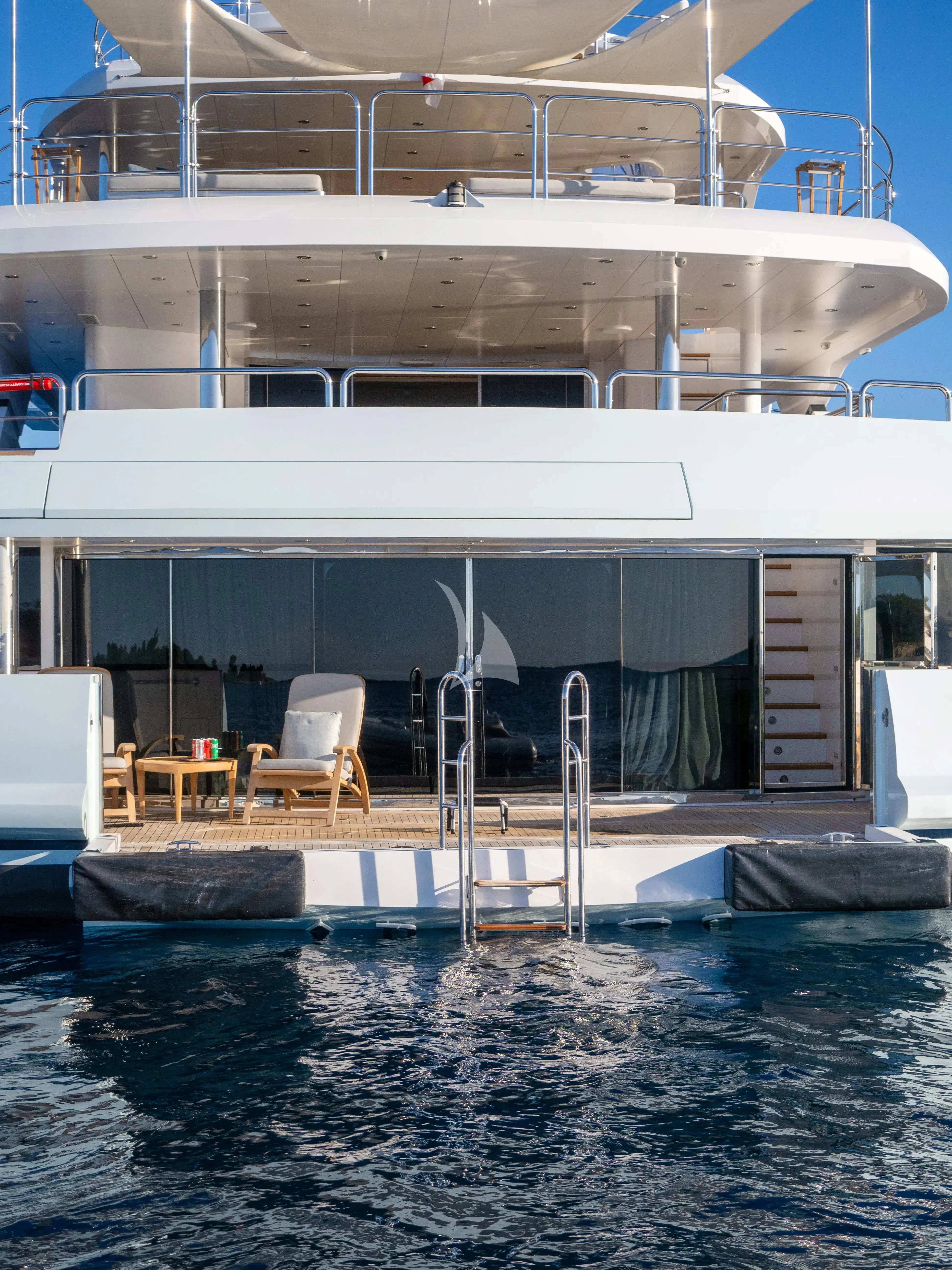 a building with a pool aboard ARADOS Yacht for Charter