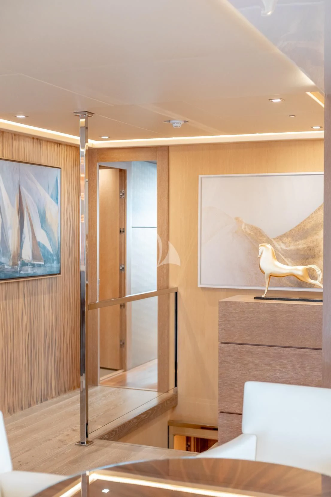 a room with a door and a bench aboard ARADOS Yacht for Charter