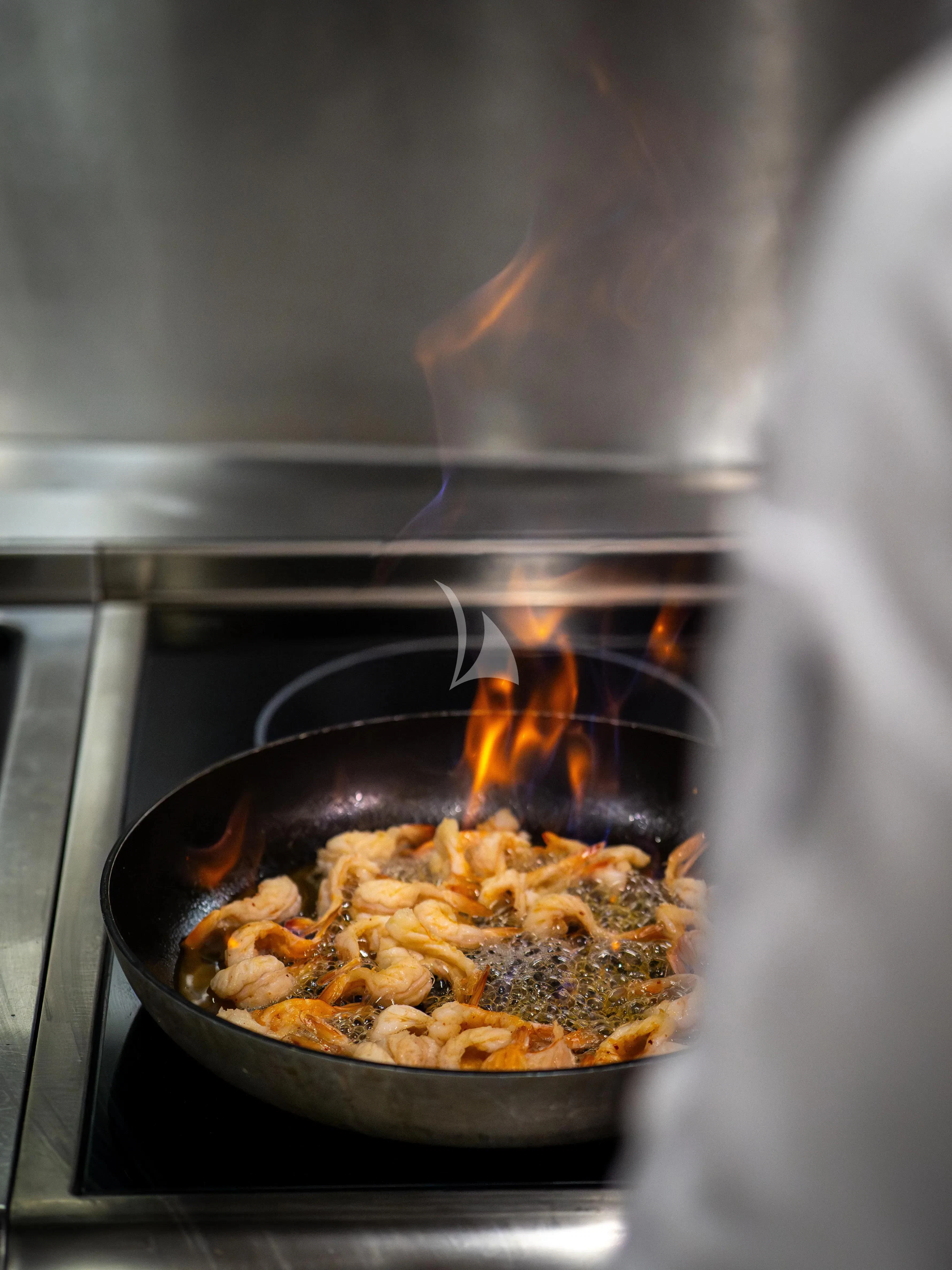 a pot of food aboard ARADOS Yacht for Charter