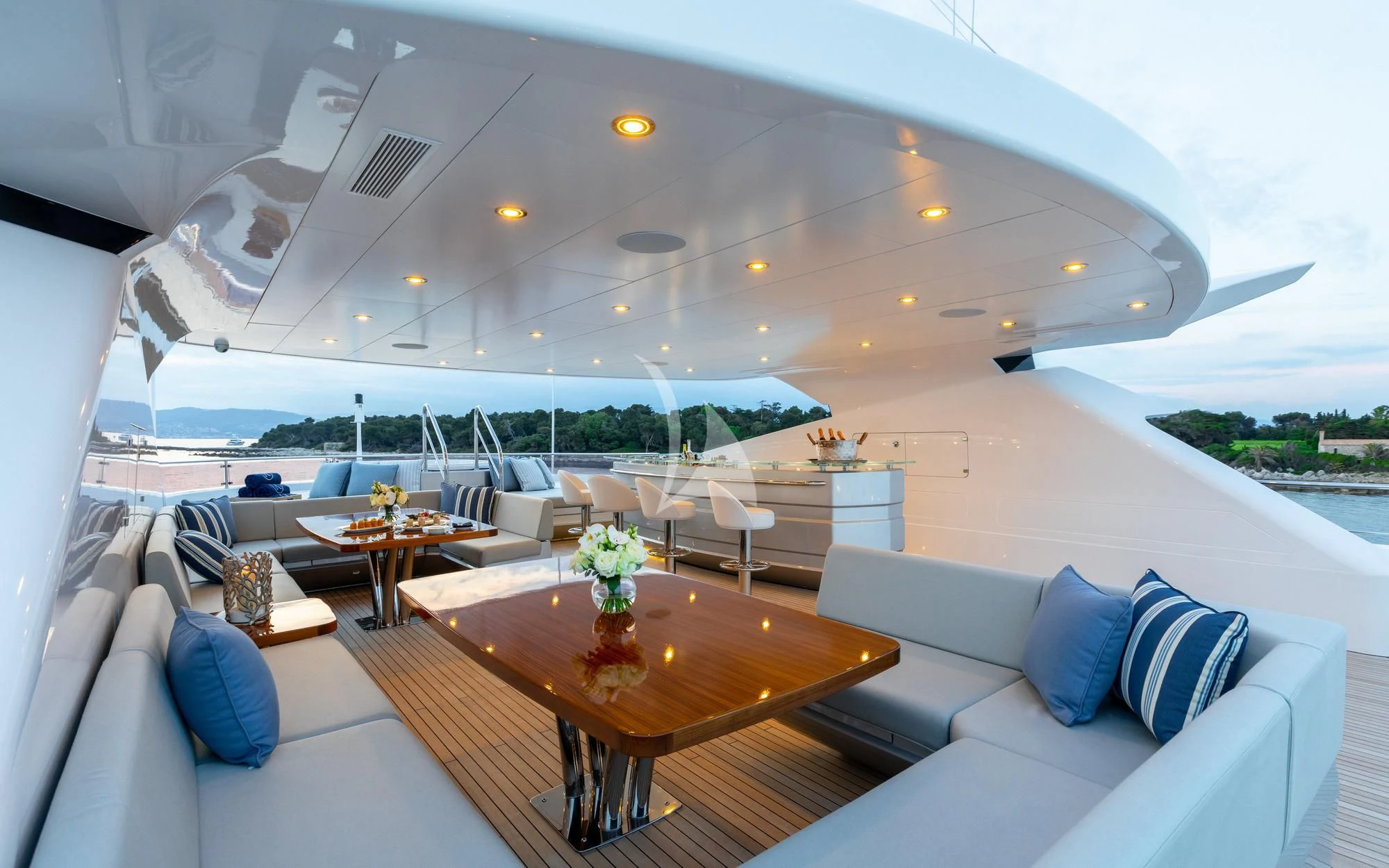 a room with a table and chairs aboard ARADOS Yacht for Charter