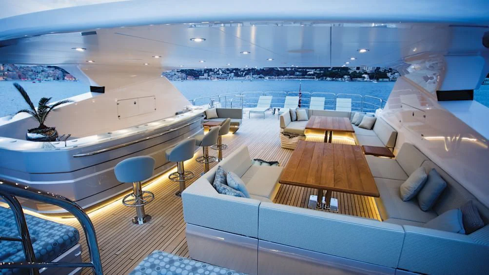 inside of a building with a large crowd of people in the front aboard ARADOS Yacht for Charter