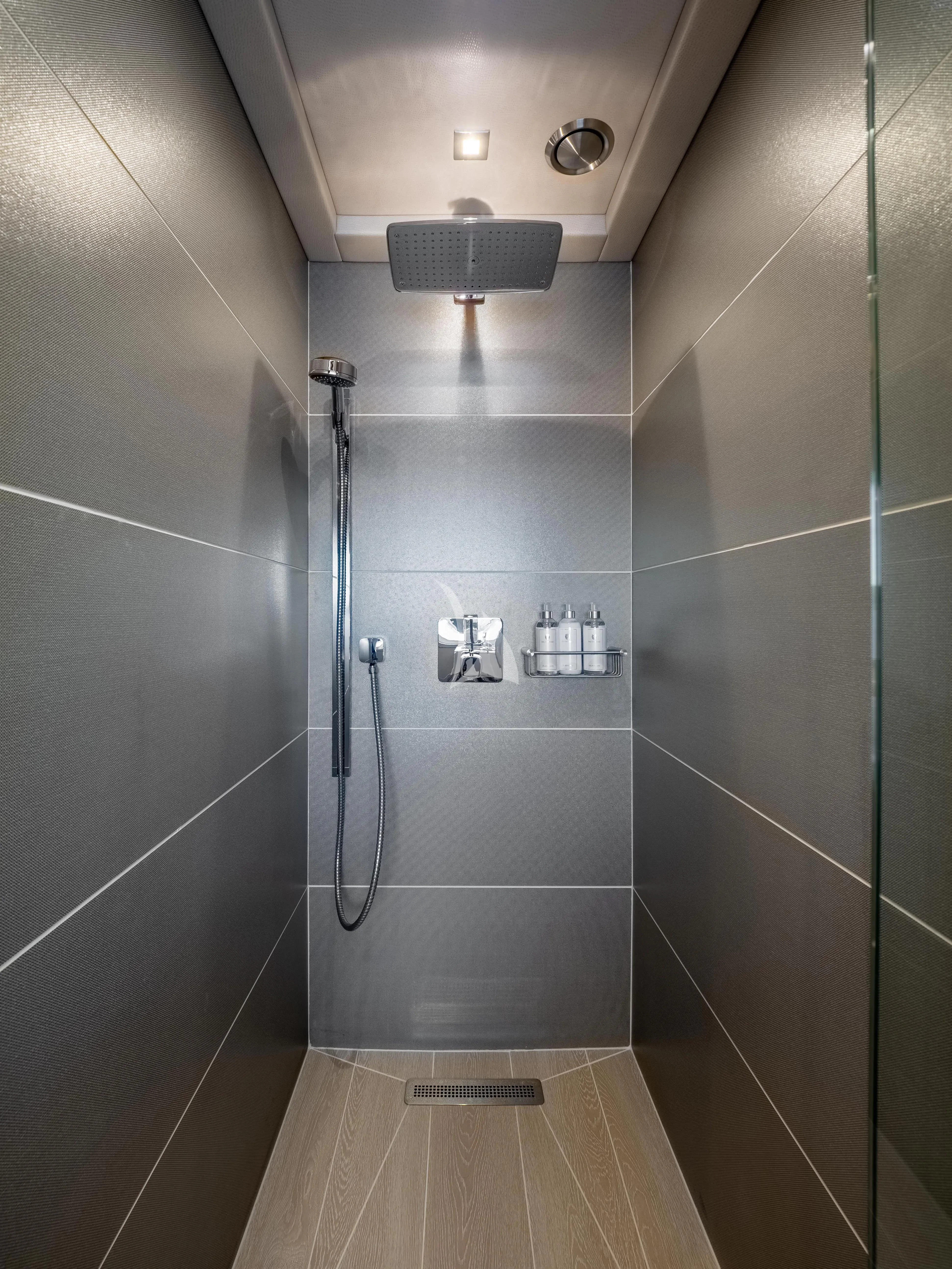 a shower with a glass door aboard ARADOS Yacht for Charter